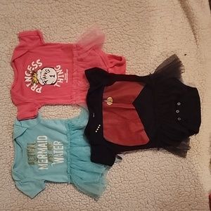 Tutu baby onsies. One of them is star trek.